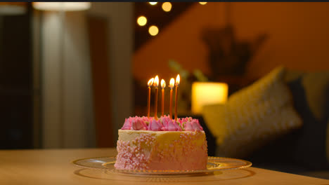 Close-Up-Of-Party-Celebration-Cake-For-Birthday-Decorated-With-Icing-And-Candles-On-Table-At-Home-3